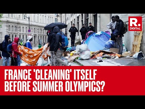 French Police Evict Migrants From A Makeshift Camp In Paris Ahead Of Summer Olympics