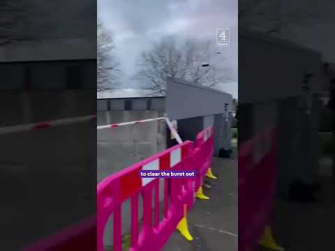 Car crashes onto train track causing chaos