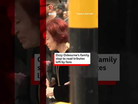 Ozzy Osbourne's family stop to read tributes in Birmingham. #OzzyOsbourne #BBCNews