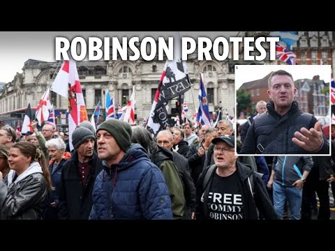 Thousands of Tommy Robinson supporters march through central London after far-right activist charged