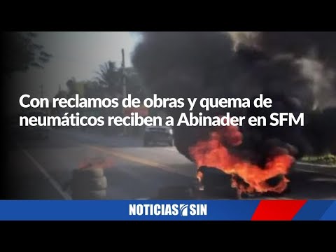 Con reclamos de obras y quema de neumáticos reciben a Abinader en SFM