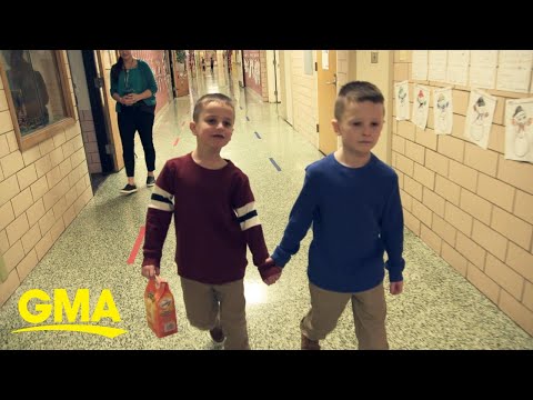 Brothers’ heart-warming routine inspires school