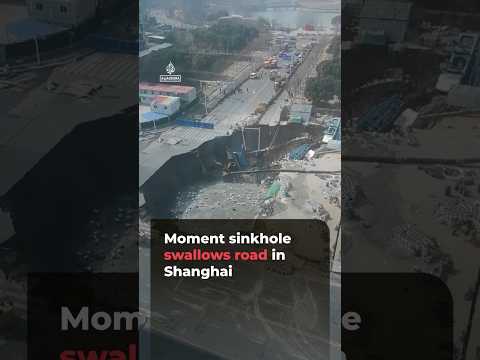 CCTV video captures moment sinkhole swallows road in Shanghai | #ajshorts