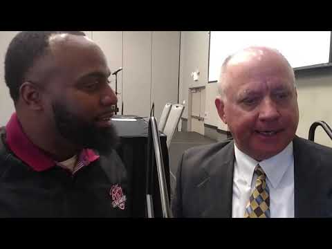 Brandon Barnett talks with SAU Coach Bill Keopple in Texarkana