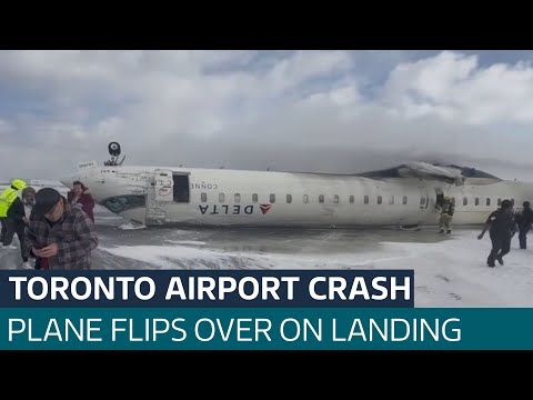 At least 15 injured after plane crash-lands and flips over at Toronto airport