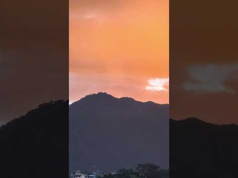 An orange sky whispers the day’s final lullaby in golden hues #nature #sunset #fyp #views #memories