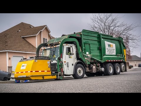 garbage trucks in action
