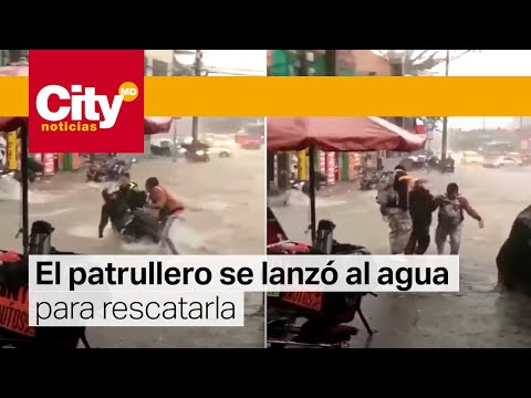 Policía rescató a mujer que era arrastrada por el agua en San Cristóbal | CityTv