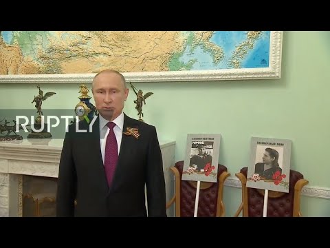 REFEED: Russian President Vladimir Putin addresses participants of the Immortal Regiment