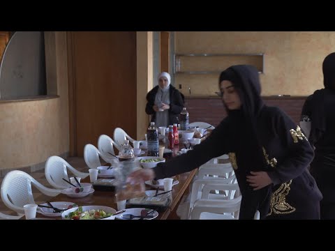 At an abandoned hotel in south Lebanon, some 60 displaced families are celebrating the Islamic holy