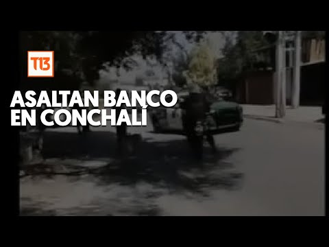 Atraco a un banco en Conchali?: Asaltante le habri?a quitado el arma al vigilante