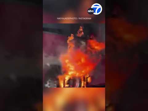 Video shows charter bus engulfed in flames on 405 Freeway following crash