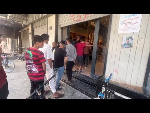 Desperate Palestinians queue for bread at bakery in Gaza City amid famine warning