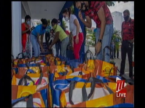 Rotary Club Maraval Donates 100 Hampers To Eight Organisations