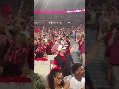 Several people not clapping some booing.TRUMP ALABAMA GEORGIA GAME