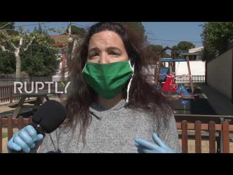 Spain: Girona volunteers walk dogs amid COVID-19 crisis