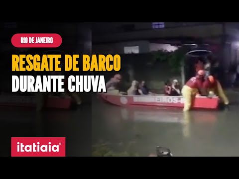 RESGATE DE FAMÍLIA É FEITO DE BARCO APÓS FORTES CHUVAS NO RIO