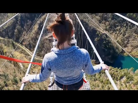 New Tibetan bridge lets thrill-seekers walk 175 metres above the ground
