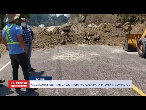 Ciudadanos cierran calle hacia Marcala para prevenir contagios