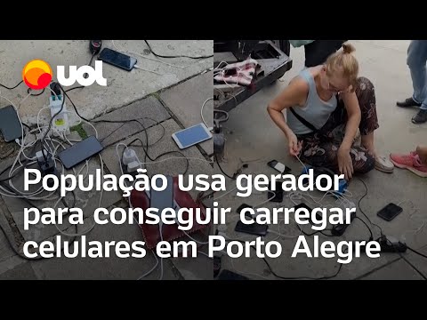 Enchentes no RS: Civis usam gerador para carregar celulares e dormem em passarela em Porto Alegre