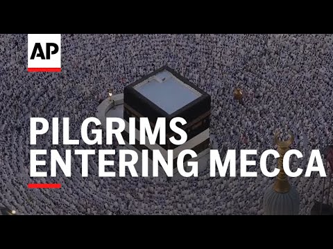 Pilgrims entering Mecca for Hajj take steps to protect themselves from heat - AP explains