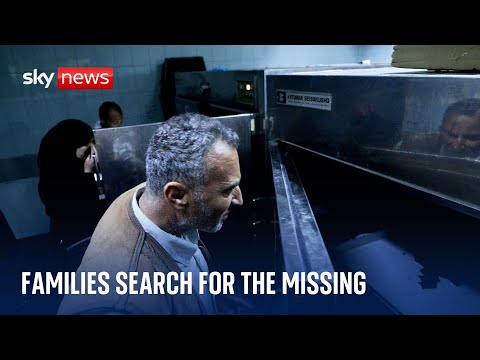 Desperate families search body bags for loved ones in Syria's morgues