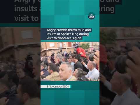 Angry crowds throw mud and insults at Spain's king during visit to flood-hit region | ITV News