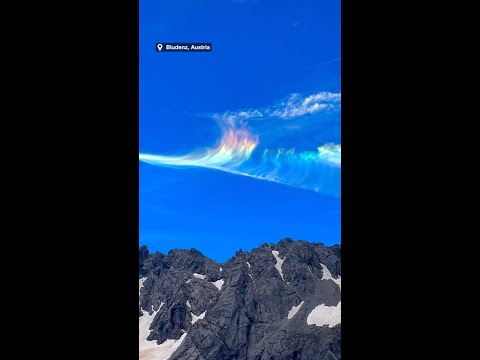 Hiker spots spectacular 'iridescent' clouds