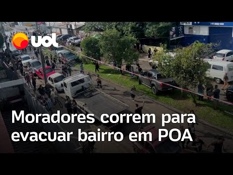 Enchentes no RS: Moradores de bairro em Porto Alegre correm para sair de casa por risco em dique