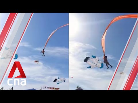 Girl lifted into the air after getting caught in kite strings at Taiwan festival