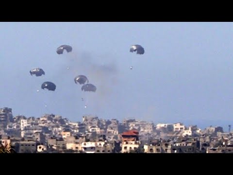 Aid airdropped on northern Gaza, seen from Israel | AFP