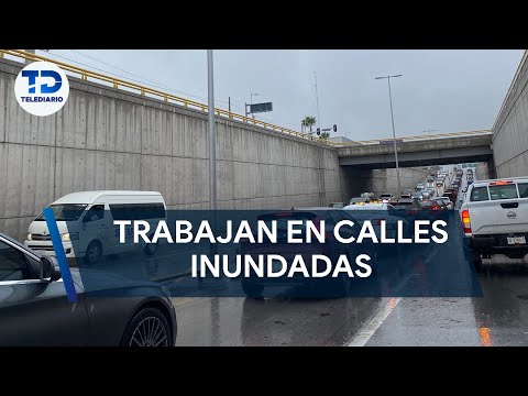 Autoridades trabajan en desaguar calles inundadas