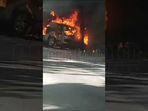 Cellphone footage captured a vehicle engulfed in flames along the North Coast Road