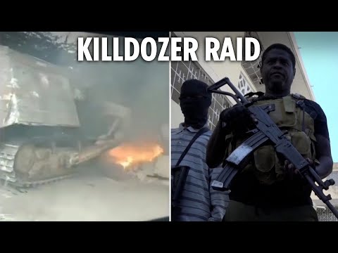 Moment commandos use a KILLDOZER in crushing dawn raid on drug warlord Barbecue's Haitian HQ