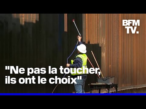 Le mur frontalier entre les États-Unis et le Mexique repeint en noir pour dissuader les migrants