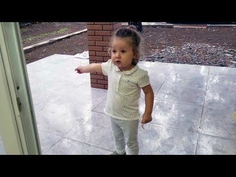 Cute BABY Loves Playing in The Rain - AWESOME KIDS Reaction