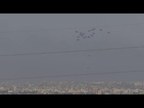 Aid supplies dropped into Gaza Strip as smoke billows over the area, and near Khan Younis