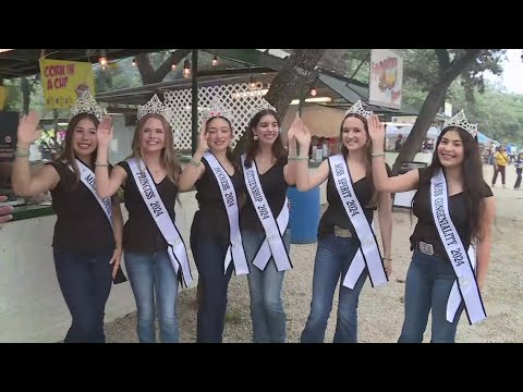 Weather Chief Bill Taylor talks with Miss Helotes and her court at the Cornyval Festival