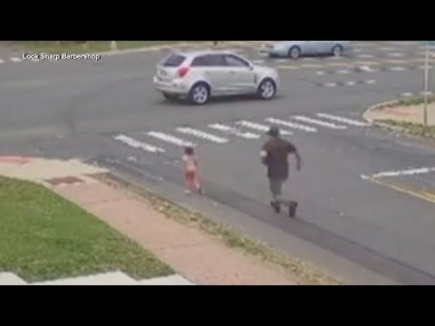 WATCH: Barbers jump into action to stop little girl running toward busy intersection