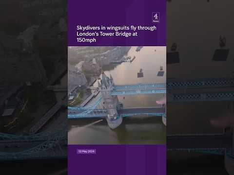 Skydivers fly though London’s Tower Bridge at 150mph