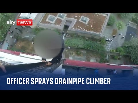 Met police officer sprays man climbing down drainpipe