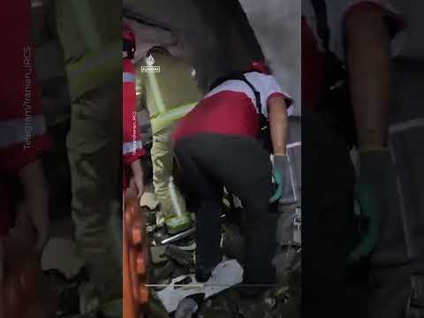 Iranian rescuers save two civilians from rubble after US-Israeli strikes | AJ #shorts