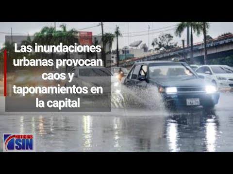 Las inundaciones urbanas provocan caos y taponamientos en la capital