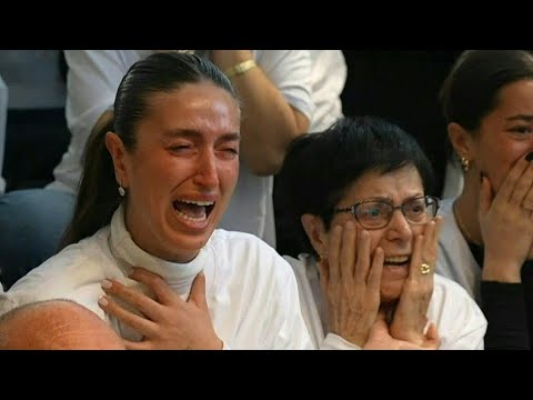 Relatives of Omer Shem Tov react as he is handed over to Red Cross in Gaza | AFP