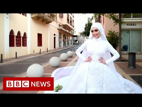 Beirut: The bride being photographed in wedding dress as blast hit – BBC News