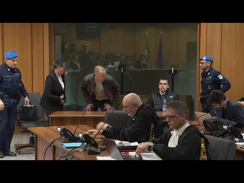 American men back in Italian court after convictions in officer's slaying were thrown out: Elder did