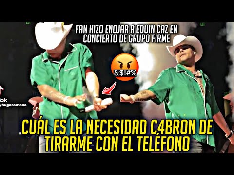 HACEN ENOJAR a EDUIN CAZ le TIRAN CON UN TELÉFONO al ESCENARIO