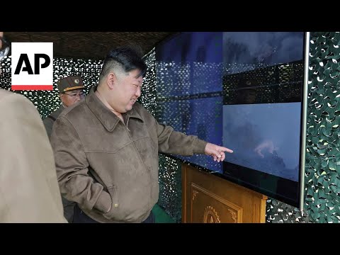 North Korean state media shows Kim Jong Un watching rocket launches