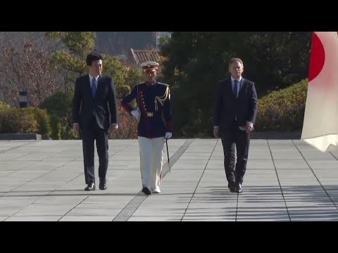 Italian and UK defense ministers met by guard of honor in Tokyo