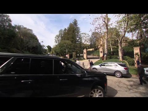 Media gathers outside Diddy's LA home during search by federal agents